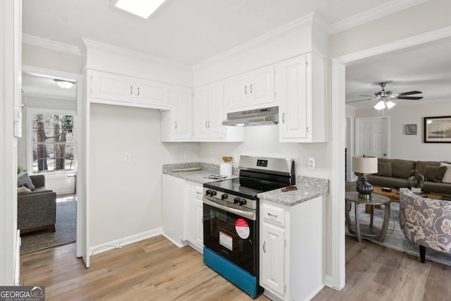 kitchen with stainless steel electric range oven, ornamental molding, light wood-style flooring, and under cabinet range hood