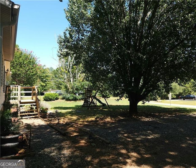 view of yard with a playground