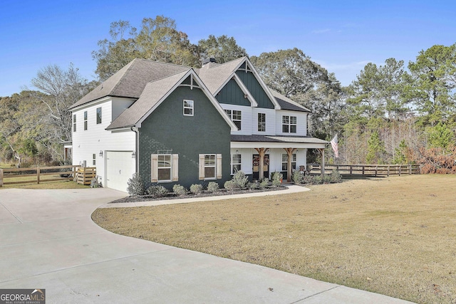 craftsman-style house featuring fence, covered porch, roof with shingles, french doors, and board and batten siding
