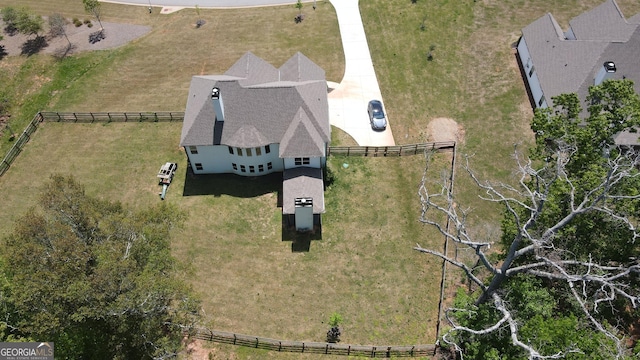 view of patio / terrace featuring fence and an outdoor stone fireplace