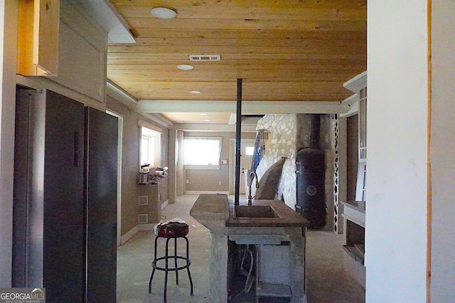 interior space with visible vents and a sink