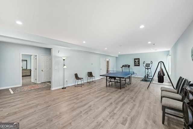 game room featuring light wood-style flooring, baseboards, and recessed lighting