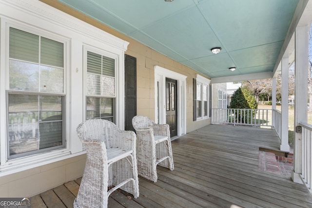 wooden deck featuring a porch