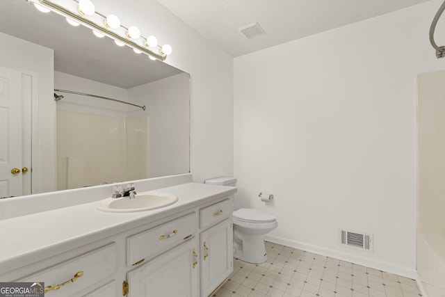 full bathroom with tile patterned floors, visible vents, toilet, and walk in shower