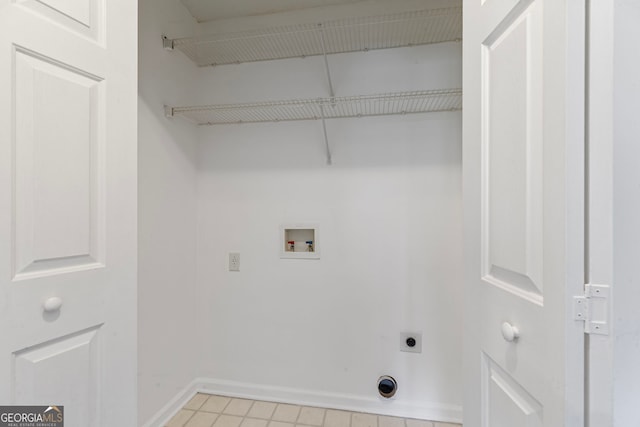 laundry room featuring laundry area, electric dryer hookup, baseboards, and washer hookup