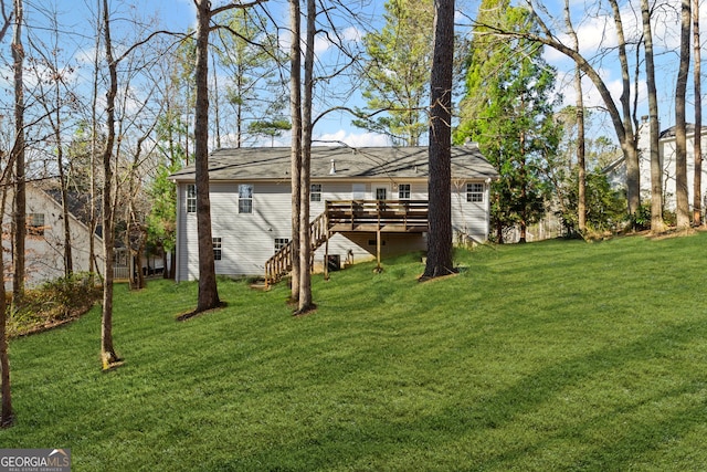 view of yard with stairway and a wooden deck