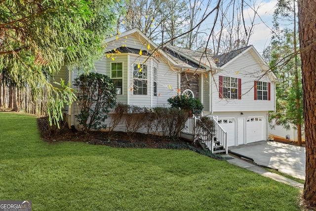 view of front facade featuring concrete driveway, a garage, and a front yard