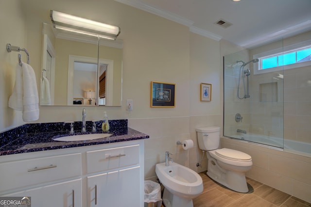 bathroom with toilet, tile walls, visible vents, a bidet, and crown molding