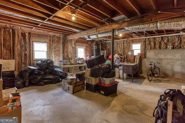 misc room featuring plenty of natural light and concrete flooring