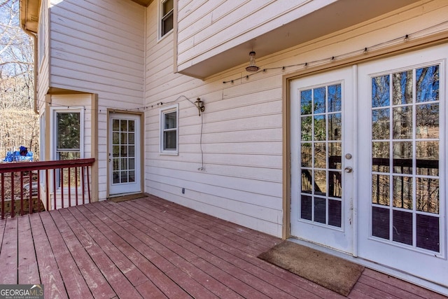 wooden terrace featuring french doors