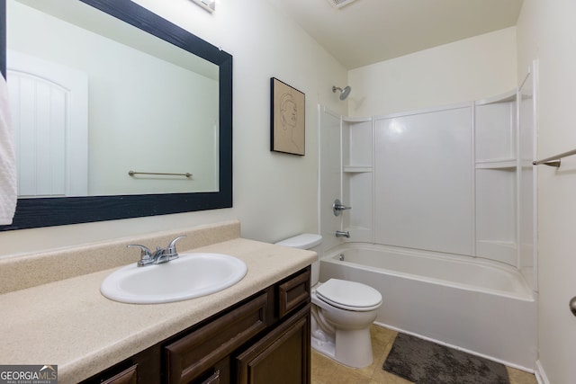 bathroom with tub / shower combination, toilet, and vanity