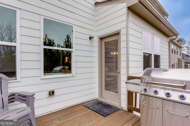 doorway to property with a wooden deck