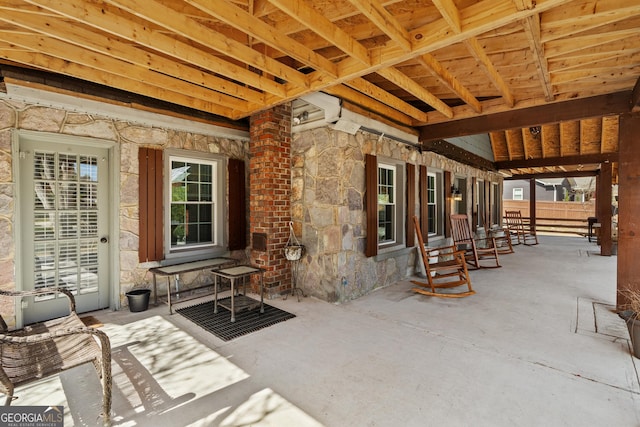 view of patio / terrace featuring fence