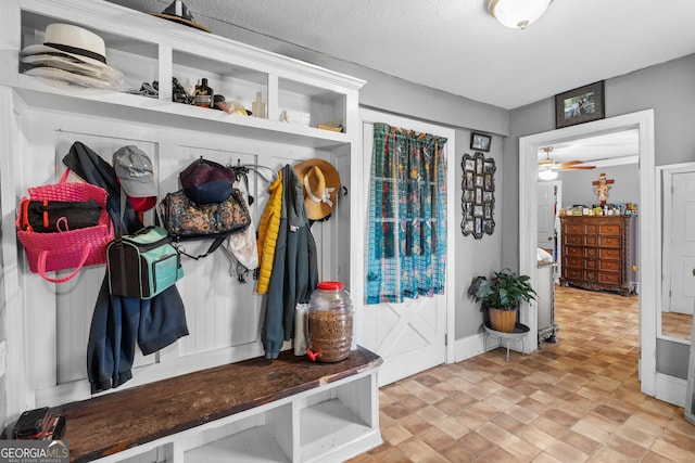 mudroom with a ceiling fan