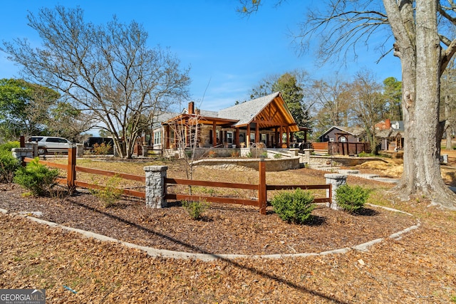 exterior space with a fenced front yard