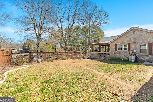 view of yard with a fenced backyard