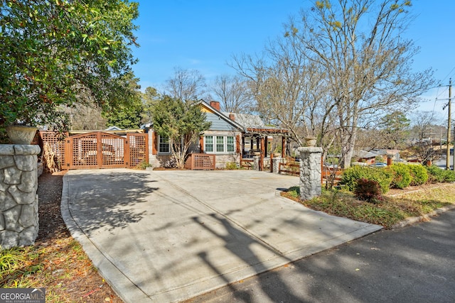 view of front of home featuring a pergola