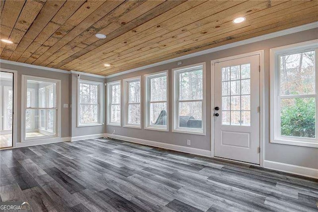 unfurnished sunroom featuring wooden ceiling