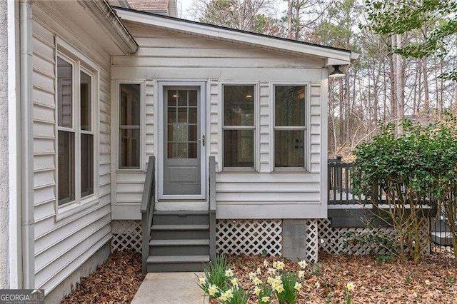 doorway to property featuring crawl space