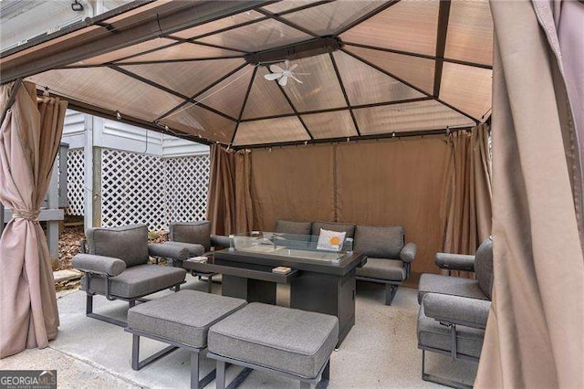 view of patio featuring outdoor dining space and a gazebo