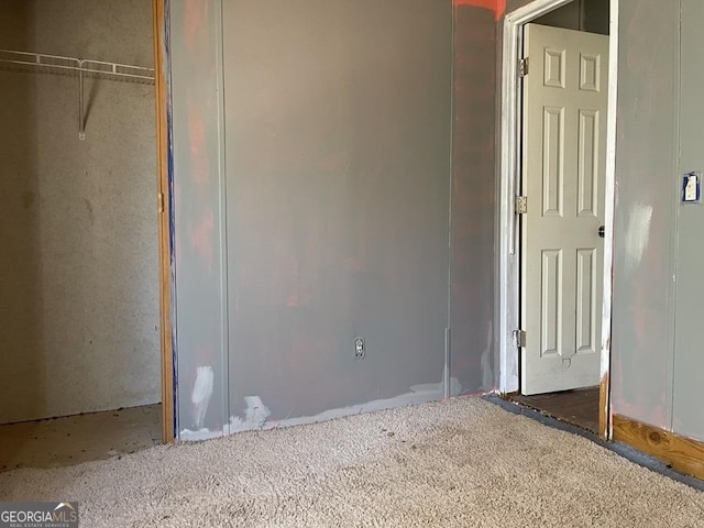 unfurnished bedroom featuring a closet