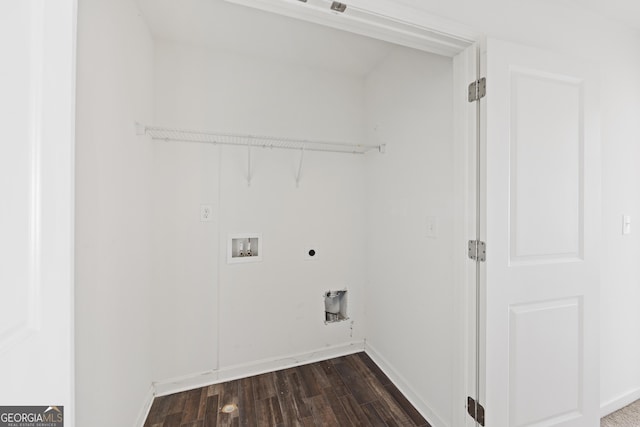 clothes washing area with baseboards, laundry area, electric dryer hookup, washer hookup, and dark wood-type flooring