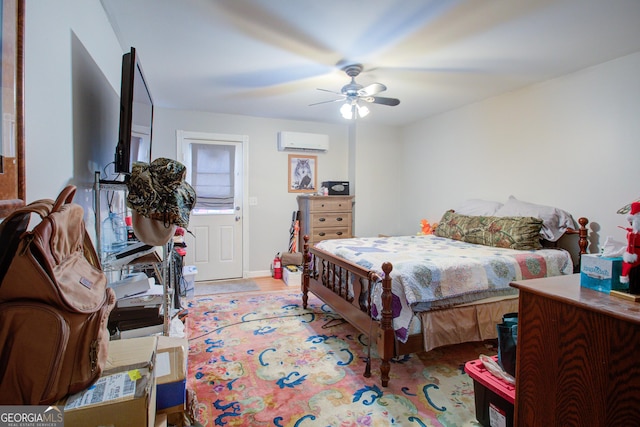 bedroom featuring baseboards, a wall mounted air conditioner, and ceiling fan