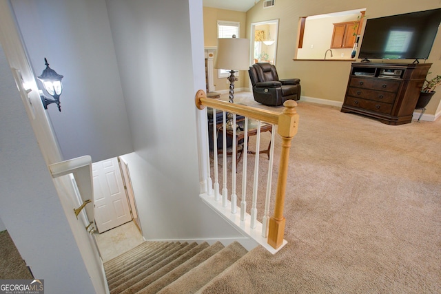 6935 Autumn Hills Dr, Cumming, GA 30028 - stairs with baseboards, visible vents, and carpet