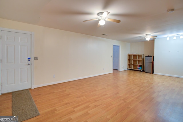 6935 Autumn Hills Dr, Cumming, GA 30028 - empty room featuring baseboards, a ceiling fan, visible vents, and light wood finished floors
