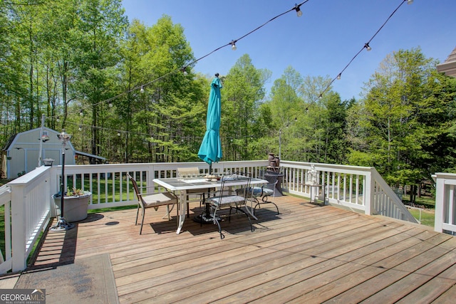 6935 Autumn Hills Dr, Cumming, GA 30028 - wooden terrace featuring outdoor dining area