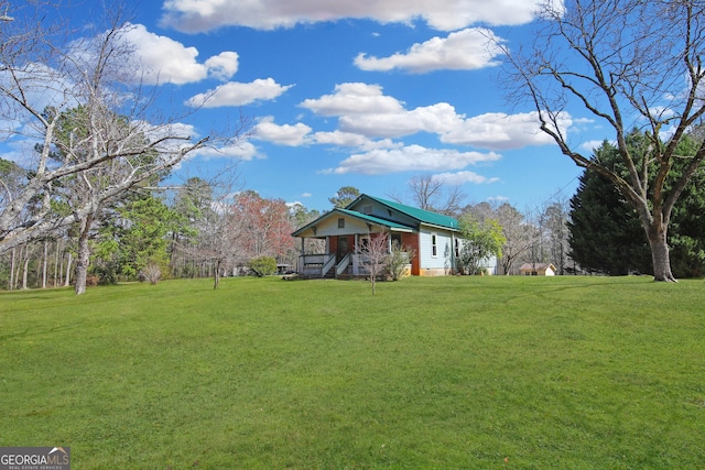 view of yard with a porch