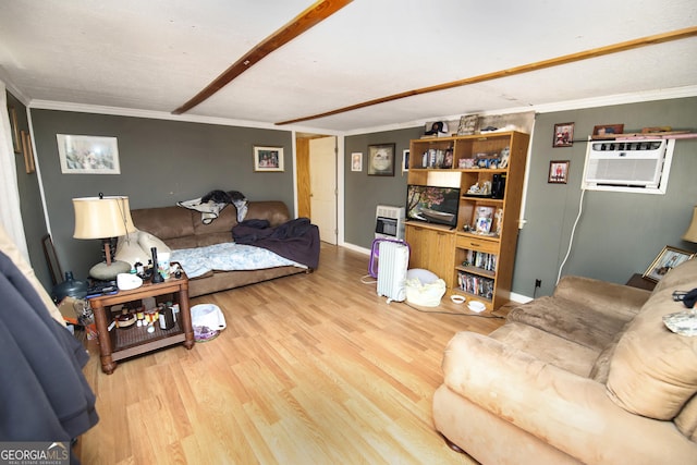 49 Thompson Rd, Lagrange, GA 30240 - living room featuring wood finished floors, crown molding, heating unit, and a wall mounted air conditioner