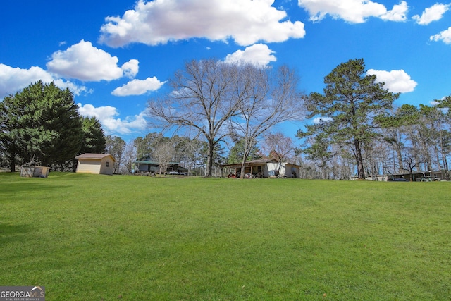 49 Thompson Rd, Lagrange, GA 30240 - view of grassy yard with a shed