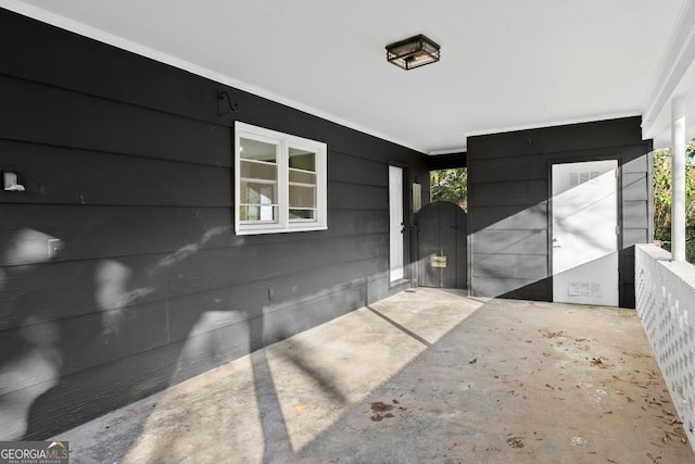 doorway to property featuring a gate