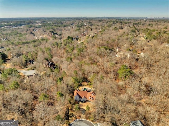 drone / aerial view with a forest view