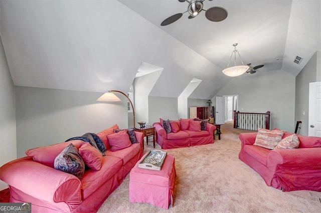 living room featuring lofted ceiling, carpet flooring, visible vents, and ceiling fan