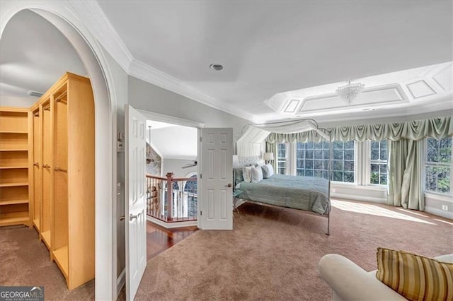 carpeted bedroom featuring arched walkways and ornamental molding