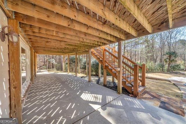 view of patio with stairway