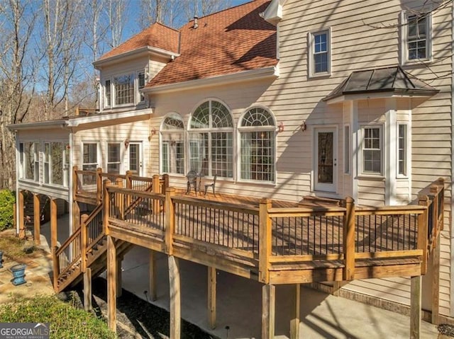 3460 Mansions Pkwy, Berkeley Lake, GA 30096 - rear view of house featuring a deck, a shingled roof, and stairs