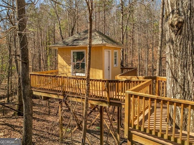 3460 Mansions Pkwy, Berkeley Lake, GA 30096 - view of outbuilding with a view of trees and stairs