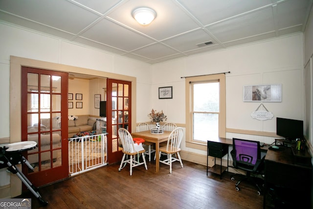 office area with french doors, visible vents, and hardwood / wood-style flooring