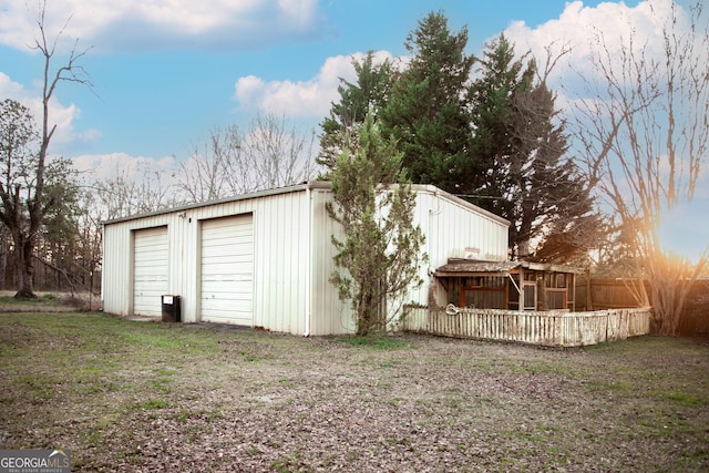 detached garage with fence