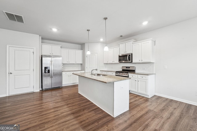 kitchen featuring stainless steel appliances, dark wood-type flooring, visible vents, and white cabinetry