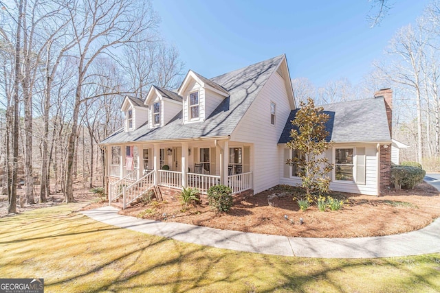 view of front facade with a porch and a front yard