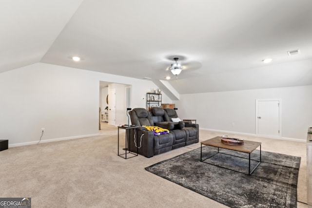 living room featuring carpet, lofted ceiling, visible vents, ceiling fan, and baseboards