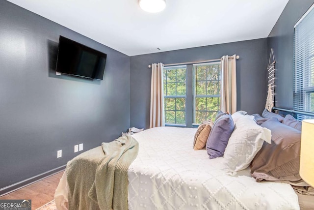 bedroom featuring baseboards