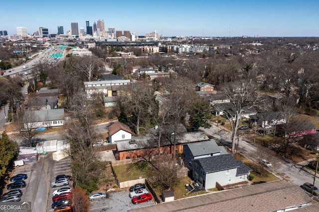 birds eye view of property featuring a view of city