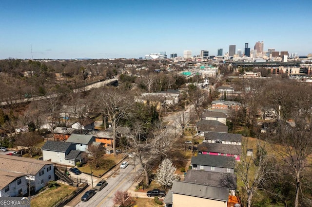 birds eye view of property with a city view