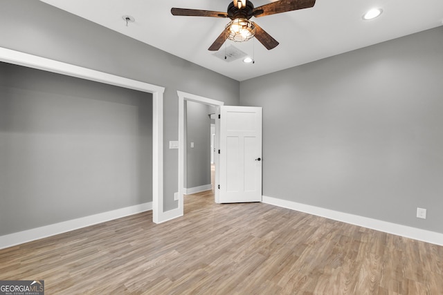 unfurnished bedroom with recessed lighting, visible vents, light wood-style flooring, and baseboards