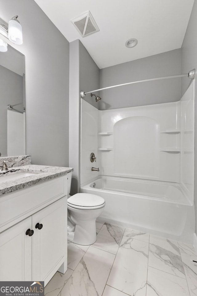 bathroom featuring marble finish floor, visible vents, vanity, and shower / bathtub combination